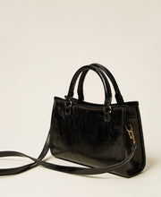 Carica l'immagine nel visualizzatore di Gallery, Borsa bauletto con charms
€ 108.00